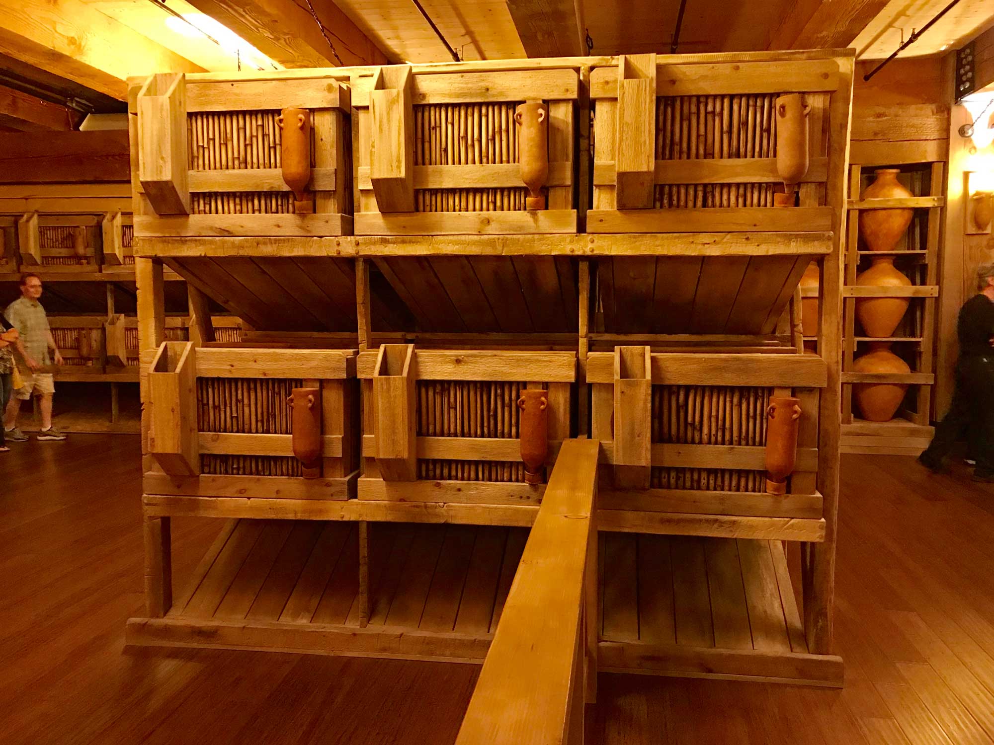 wooden boxes stacked in the row on top of each other