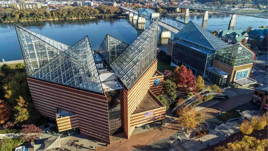 two buildings from above with glass roofs